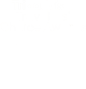 Tripadvisor Travelers' Choice Awards 2025 badge with owl and laurel indicating Nusa Lembongan's award.
